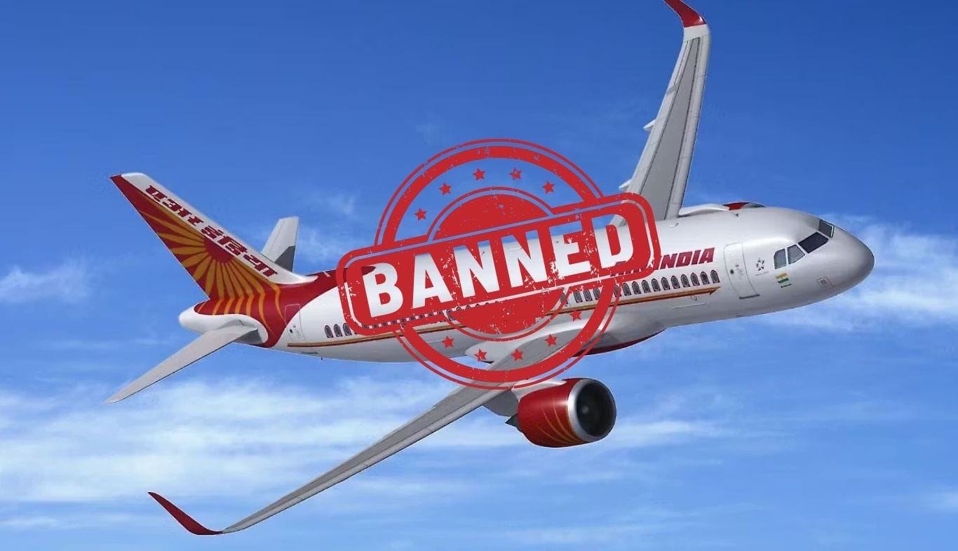 Pakistan airspace ban on Indian aircraft shown through a commercial plane flying over a cloudy sky near the India-Pakistan border