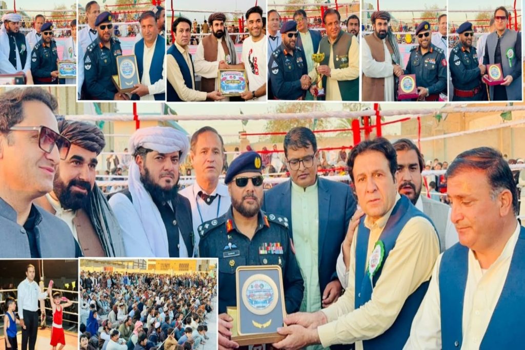 Brigadier Zarar Ahmed distributes medals and trophies to successful boxers at Chaman Boxing Championship.