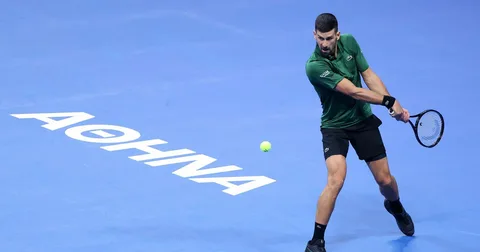 Novak Djokovic celebrating after beating Nuno Borges in the first round of the China Open in Beijing
