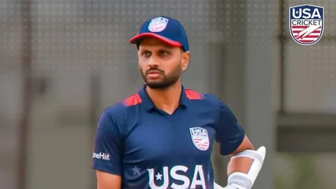 USA batter Milind Kumar celebrating his unbeaten century against the UAE at Grand Prairie Stadium in Dallas