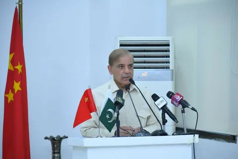 Prime Minister Shehbaz Sharif addressing a ceremony in Islamabad where he offered talks to PTI if it ends its long march and sit-ins
